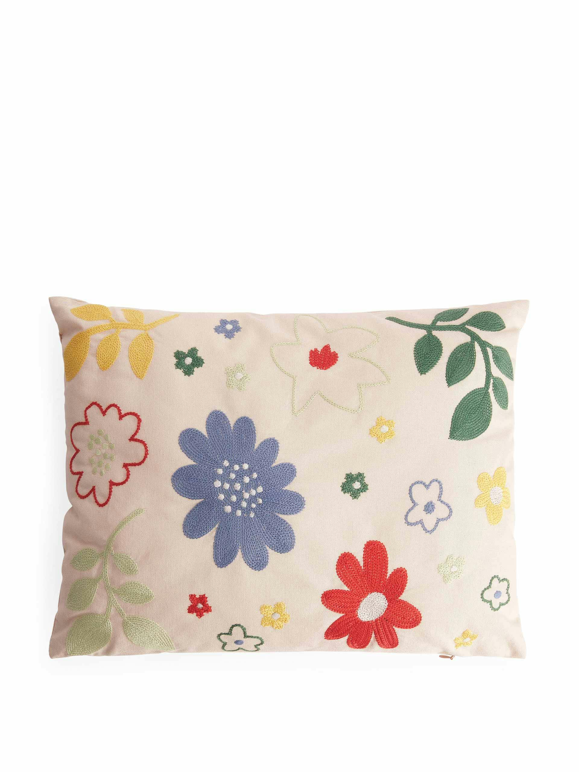 Floral embroidered cushion